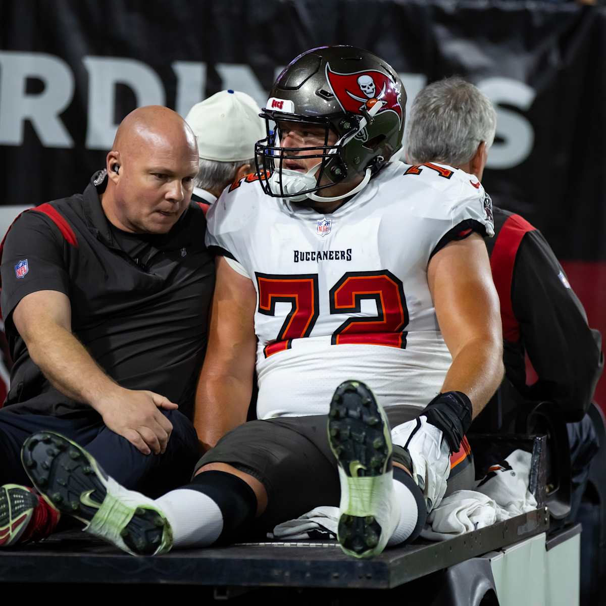 Tampa Bay Buccaneers offensive tackle Josh Wells (72) runs off the