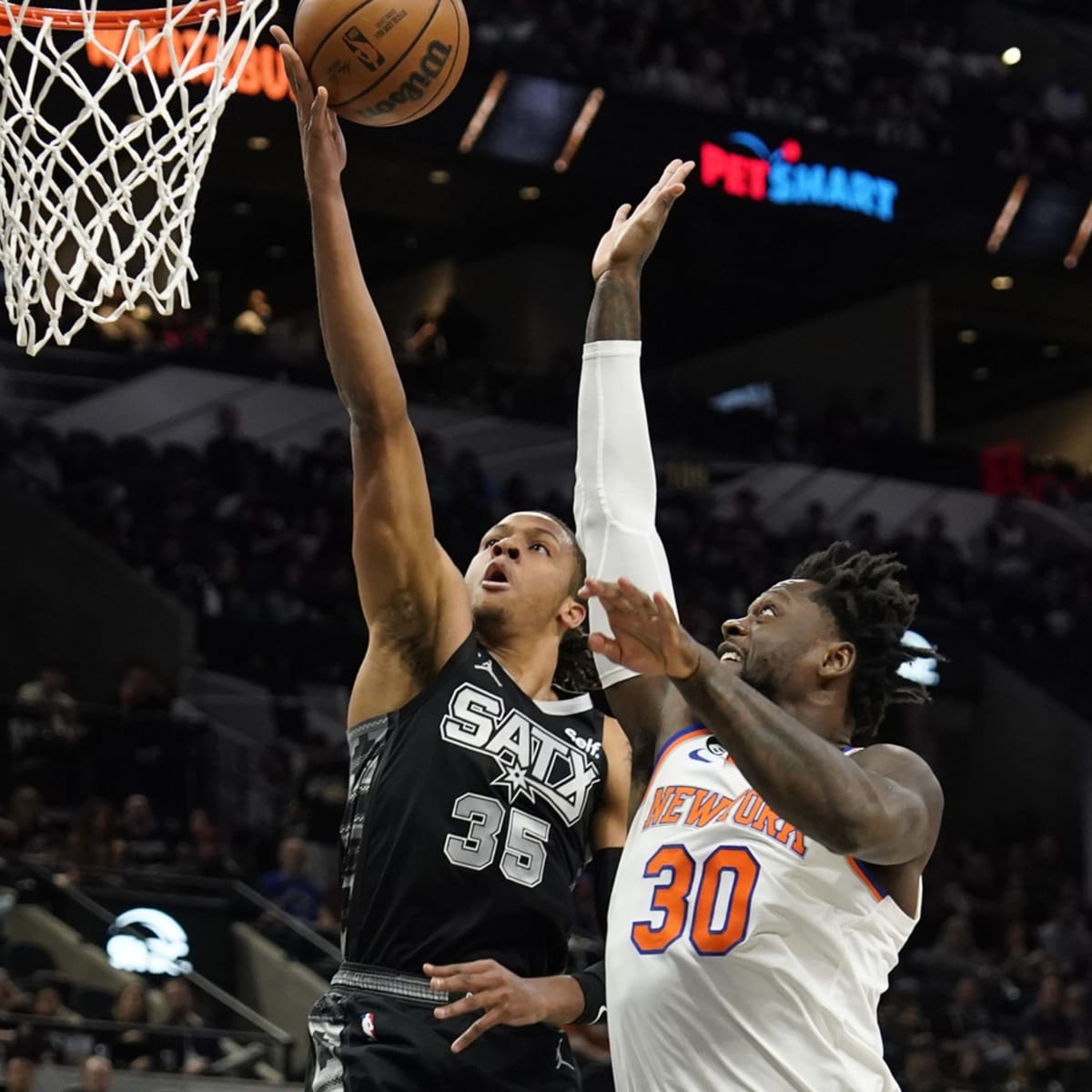 San Antonio Spurs' Romeo Langford (35) dunks during the first half