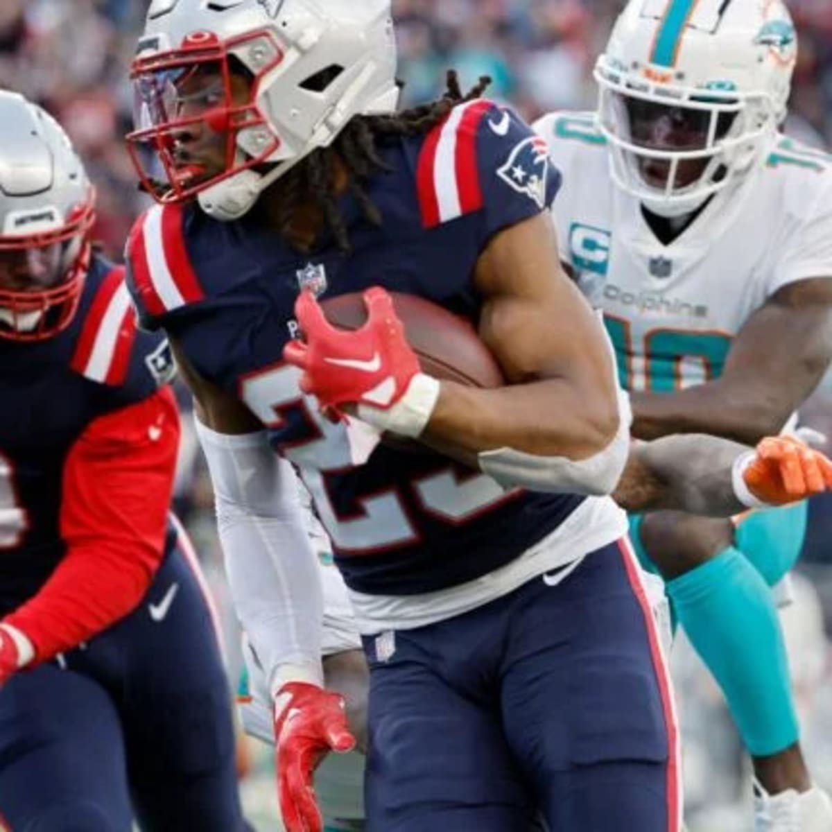 Dugger interception return helps Patriots beat Dolphins 23-21