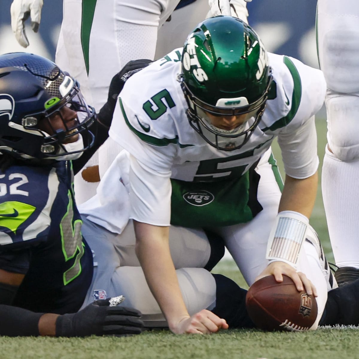 HOUSTON, TX - DECEMBER 12: Seattle Seahawks DE Darrell Taylor watches  action during game featuring the Houston Texans and the Seattle Seahawks on  December 12, 2021 at NRG Stadium in Houston, TX. (