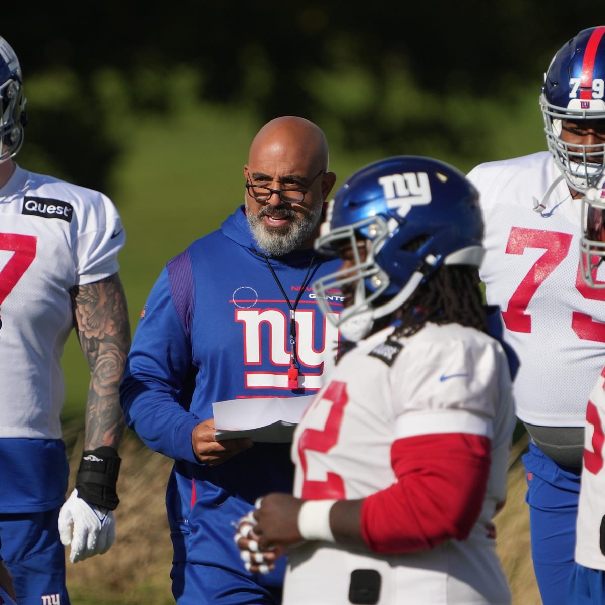 New York Giants guard Joshua Ezeudu looks to block against the New