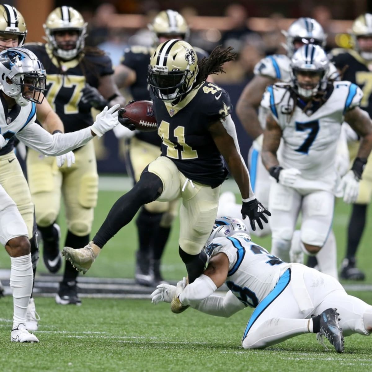 New Orleans, USA. 08th Jan, 2023. Carolina Panthers linebacker Frankie Luvu  (49) tackles New Orleans Saints running back Eno Benjamin (31) during a  National Football League contest at Caesars Superdome in New