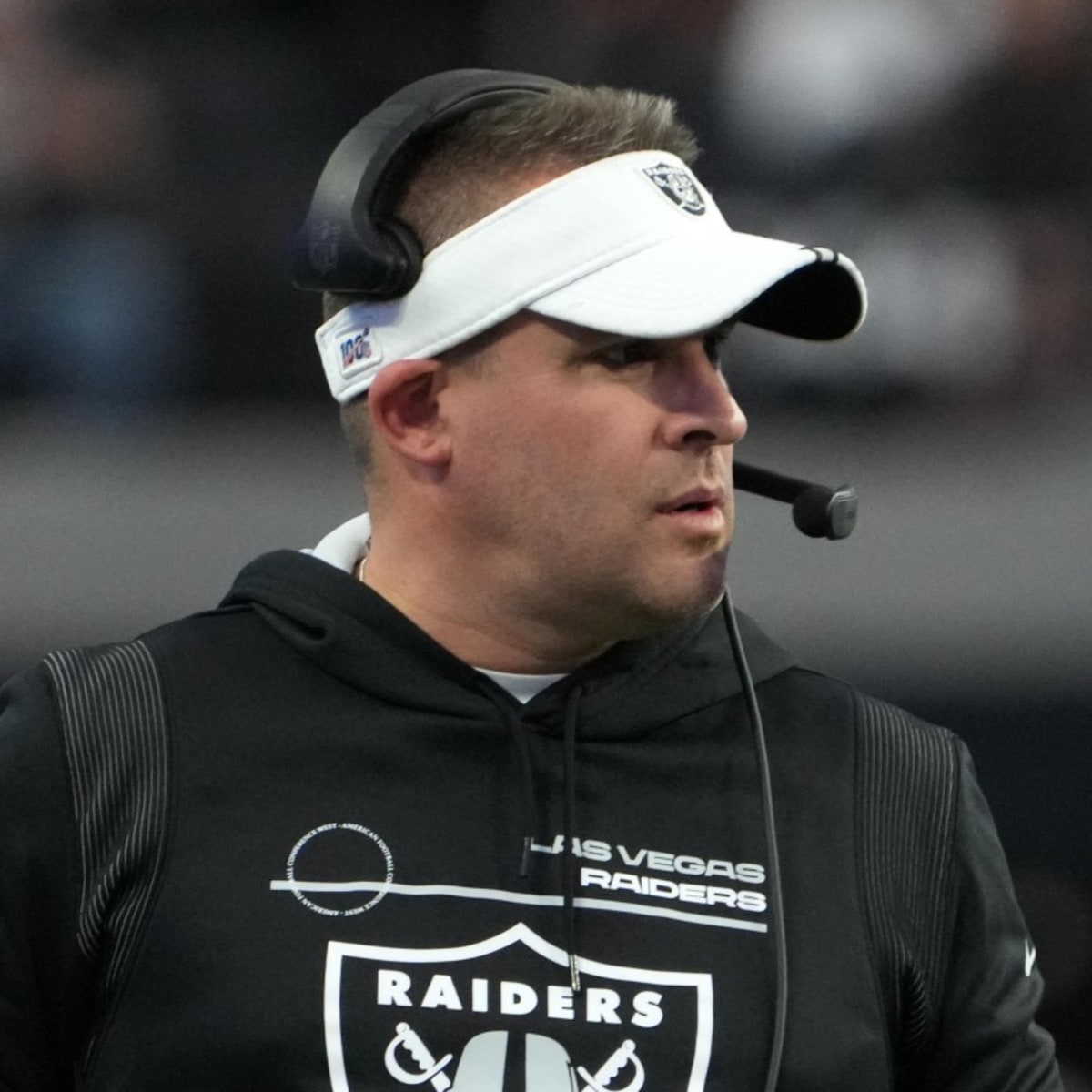 Las Vegas Raiders head coach Josh McDaniels watches replay during