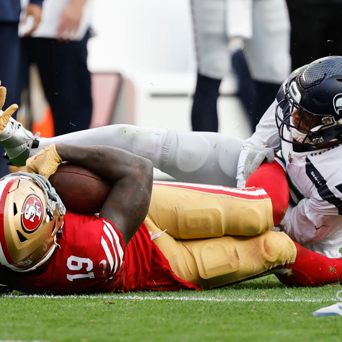 49ers and Seahawks get chippy after dirty play by Seattle sends Deebo Samuel  to sidelines