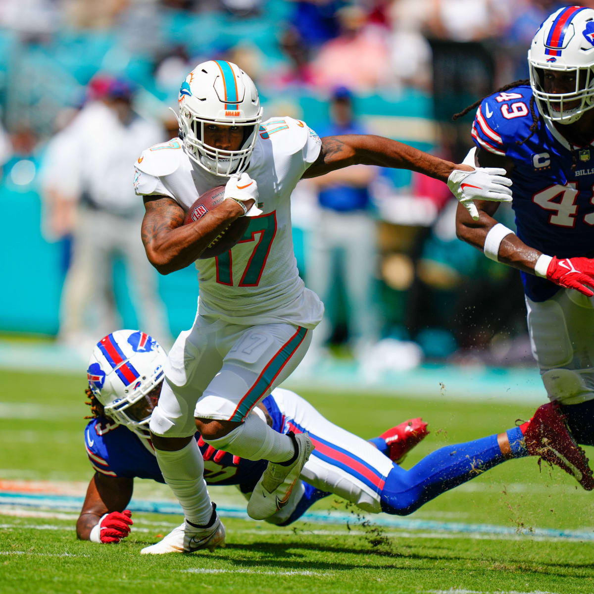 Miami Dolphins wide receiver Jaylen Waddle (17) warms up on the field  before an NFL football game against the Buffalo Bills, Sunday, Sept. 19,  2021, in Miami Gardens, Fla. (AP Photo/Doug Murray