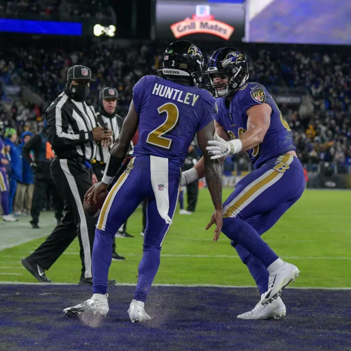 Tyler Huntley of the Baltimore Ravens fumbles the ball that is