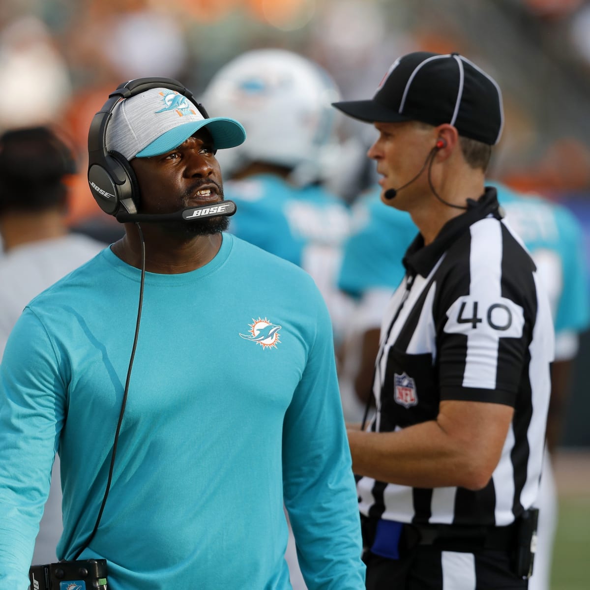 Minnesota Vikings defensive coordinator Brian Flores watches from