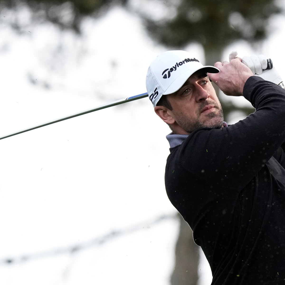 Aaron Rodgers busts out golf clubs, to play Pebble Beach Pro-Am