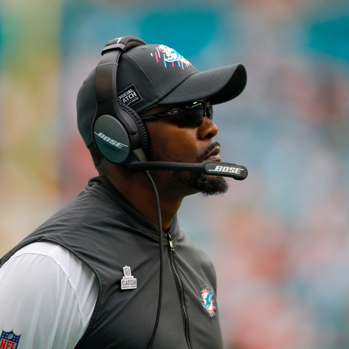 Minnesota Vikings defensive coordinator Brian Flores watches from