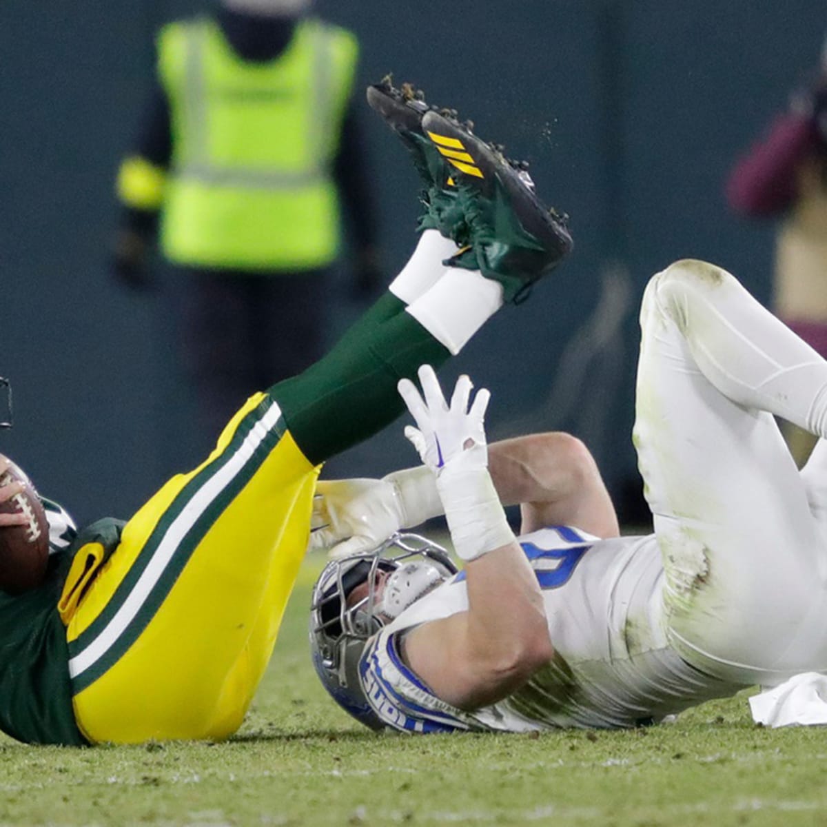 January 8, 2023: Detroit Lions defensive end Aidan Hutchinson (97) sacks  Green Bay Packers quarterback Aaron Rodgers (12) during a football game in  Green Bay, Wisconsin. Kirsten Schmitt/Cal Sport Media/Sipa USA(Credit  Image: ©