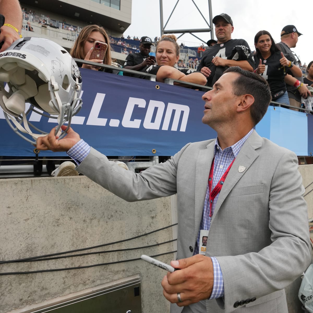 Raiders head coach Josh McDaniels, right, greets Raiders general manager Dave  Ziegler during a …