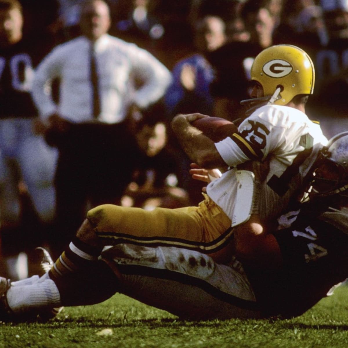 In this Dec. 20, 1970, file photo, Oakland Raiders' Ben Davidson (83) and  Tom Keating, on groun …