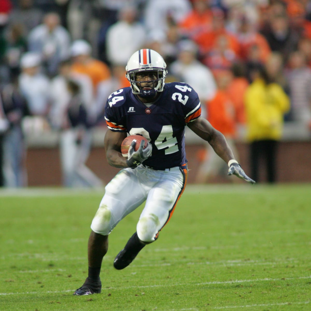 Ronnie Brown, center, a running back from Auburn, is joined by