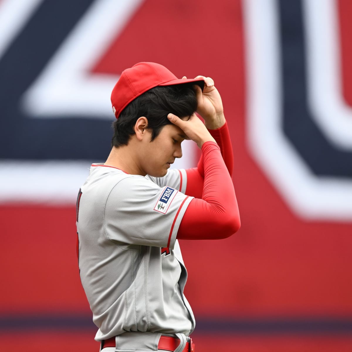 Japanese Shohei Ohtani throws a ball in the first inning during