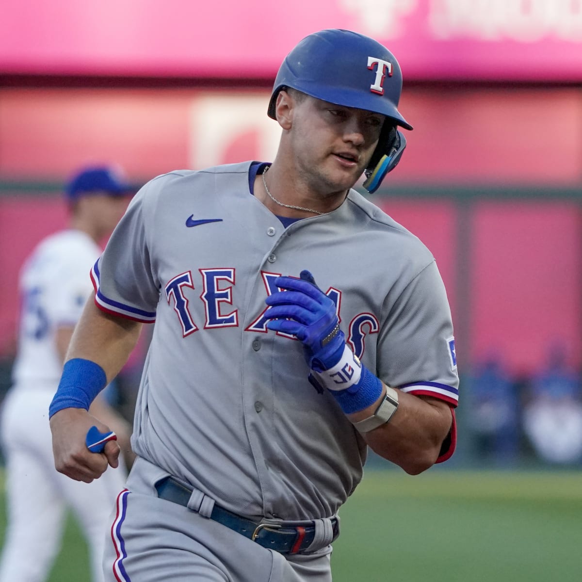 Texas Rangers' Jacob deGrom injures wrist, removed in Kansas City Royals  game 