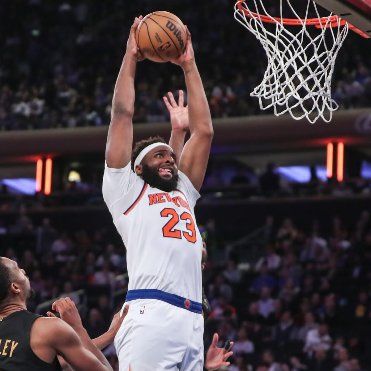 New York Knicks center Mitchell Robinson (23) rebounds against