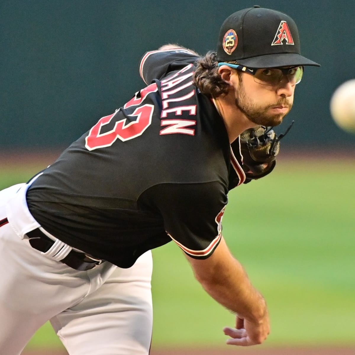 Zac Gallen Arizona Diamondbacks Unsigned White Jersey Pitching Above Photograph