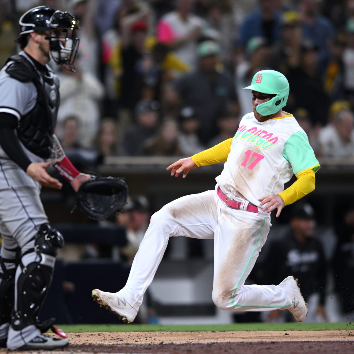 San Diego Padres catcher Yasmani Grandal gets loose before batting