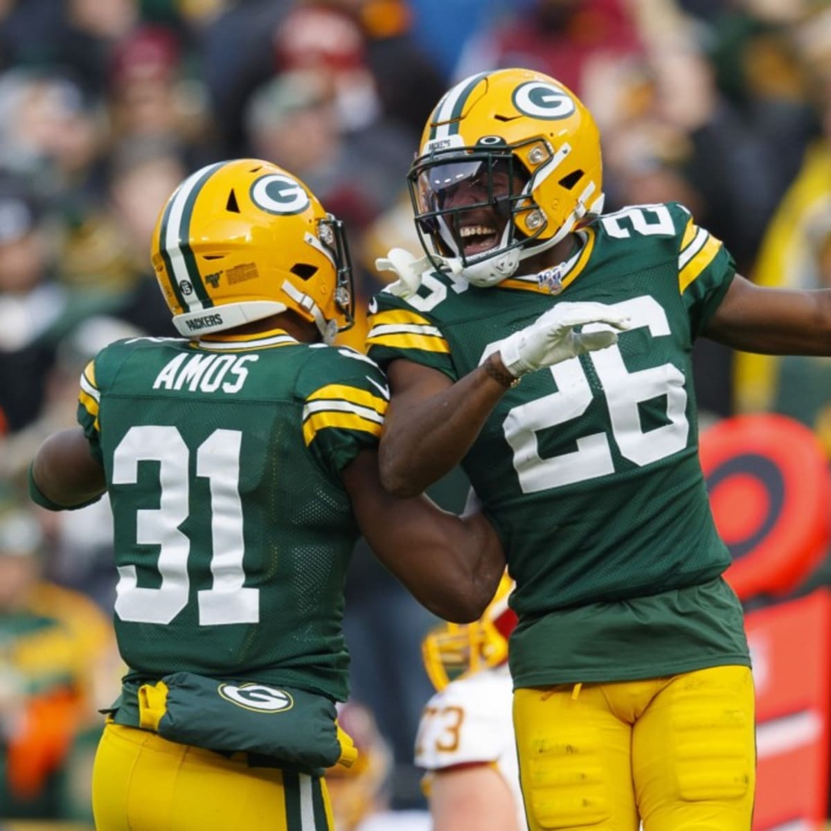 MIAMI GARDENS, FL - DECEMBER 25: Green Bay Packers safety Innis Gaines (38)  celebrates a defensive e