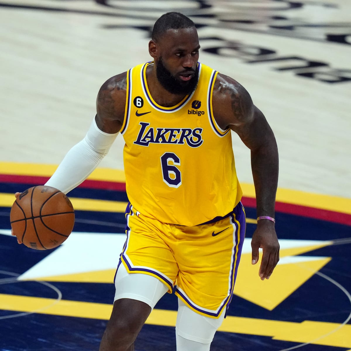 LeBron James pulls up to the Lakers vs Nuggets season-opener with