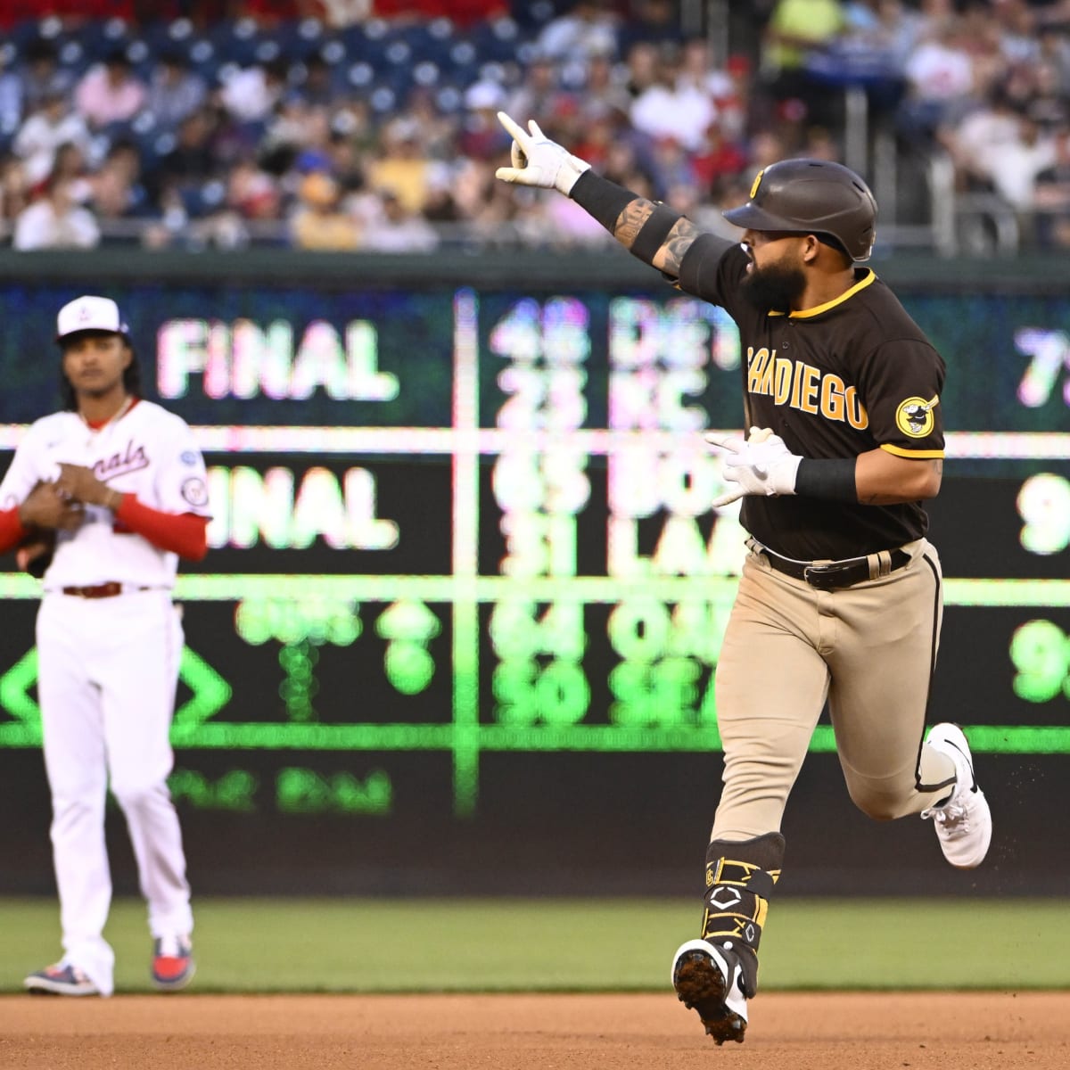 Rougned Odor of the San Diego Padres celebrates after scoring on a