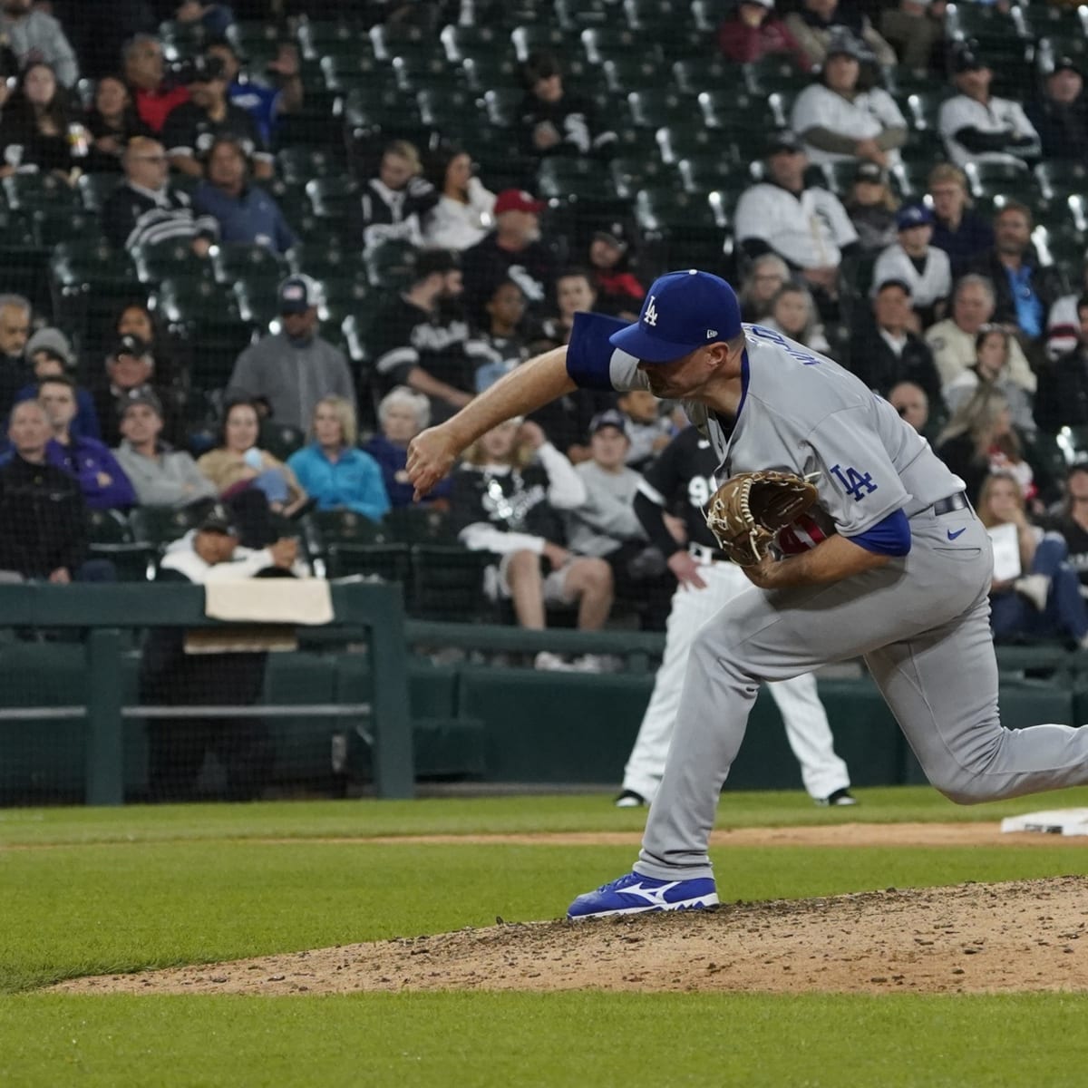 Clayton Kershaw throws a bullpen session as he works toward return