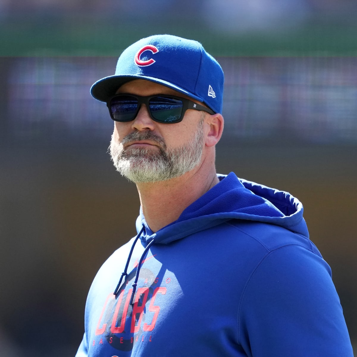 Chicago Cubs manager David Ross, second from left, talks to players during  the eighth inning of a baseball game against the Chicago White Sox in  Chicago, Wednesday, Aug. 16, 2023. (AP Photo/Nam