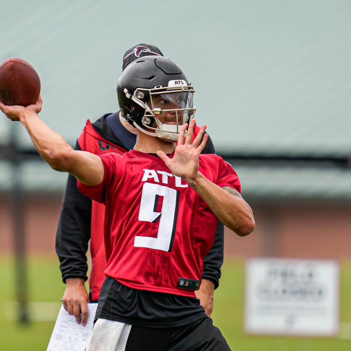 Atlanta Falcons punter Bradley Pinion (13) punts during the first half of  an NFL football game