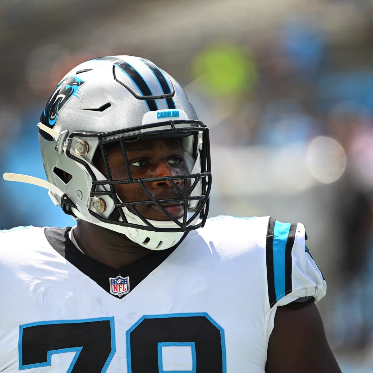 Ikem Ekwonu of the Carolina Panthers stands on the sidelines