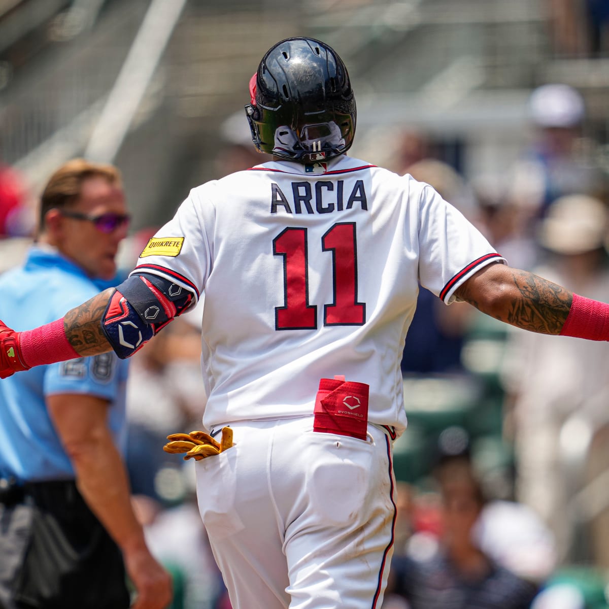 Atlanta, GA, USA. 06th Apr, 2023. Atlanta Braves infielder Orlando Arcia  begins to celebrate as he runs down the first baseline after hitting a  single to center field during the ninth inning