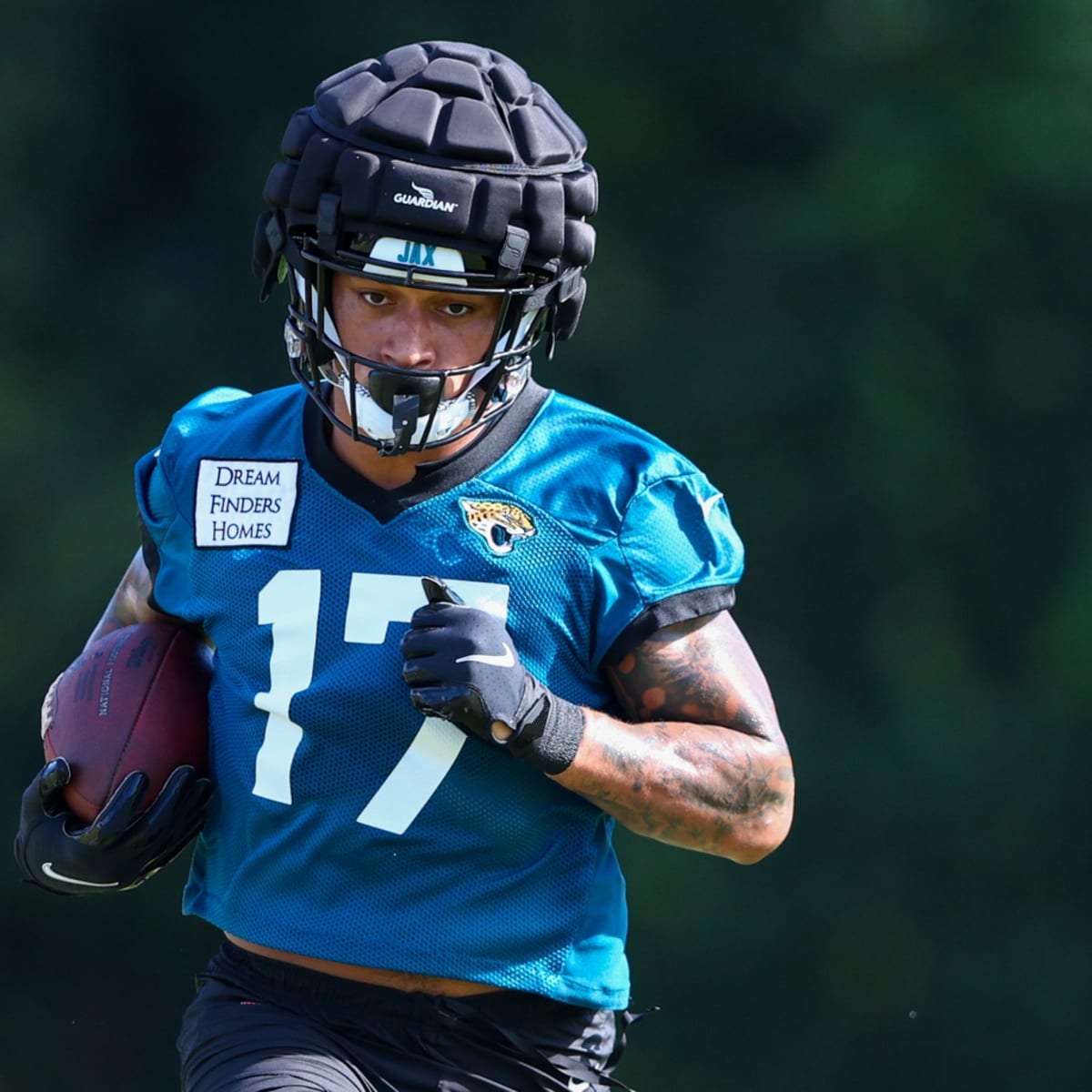 Jacksonville Jaguars tight end Evan Engram (17) walks off the field after  of an NFL football game against the Baltimore Ravens, Sunday, Nov. 27,  2022, in Jacksonville, Fla. The Jacksonville Jaguars defeated