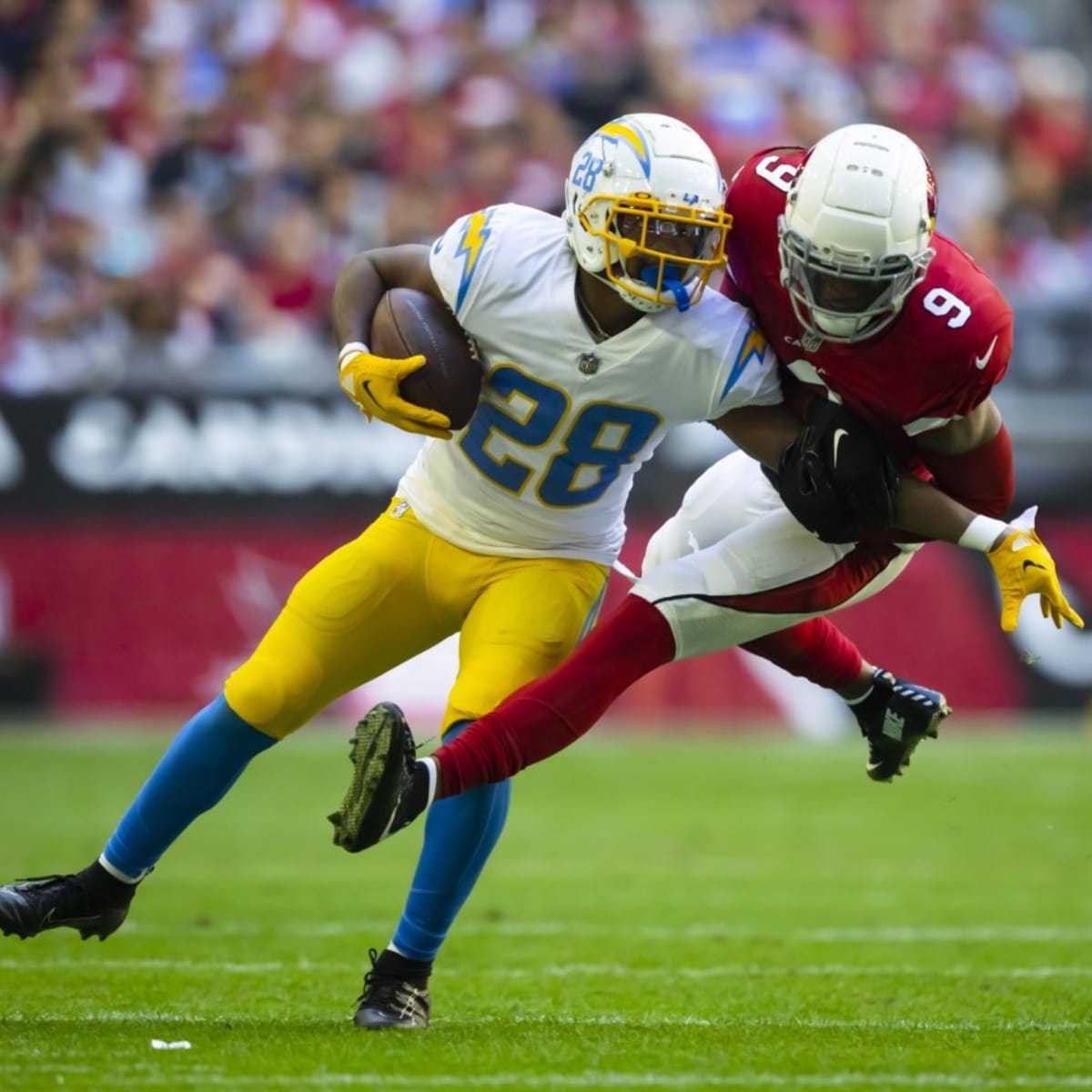 Los Angeles Chargers running back Isaiah Spiller (28) against the Denver  Broncos of an NFL football game Sunday, January 8, 2023, in Denver. (AP  Photo/Bart Young Stock Photo - Alamy