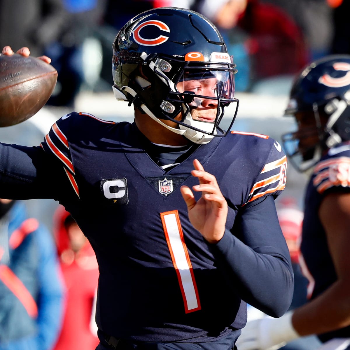 Chicago Bears quarterback Justin Fields looks to throw the football