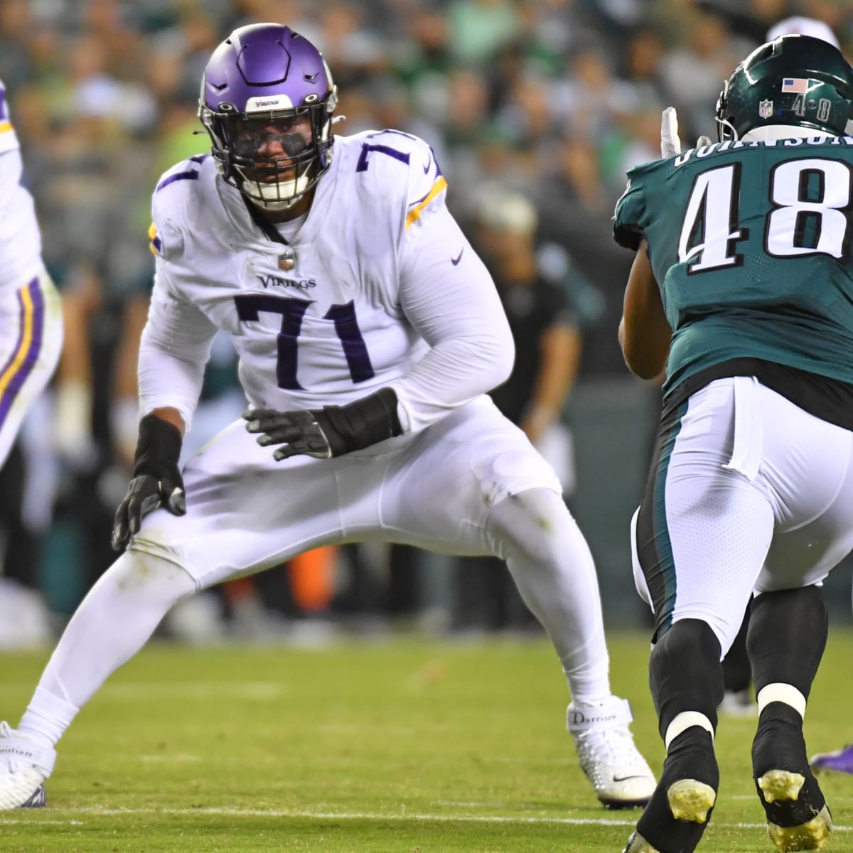 Minnesota Vikings offensive tackle Christian Darrisaw (71) blocks during  the first half of an NFL football game against the Chicago Bears, Sunday,  Jan. 8, 2023, in Chicago. (AP Photo/Kamil Krzaczynski Stock Photo - Alamy