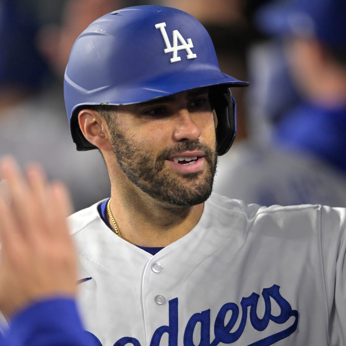 Martinez helps power Dodgers past Rockies 14-3 after severe