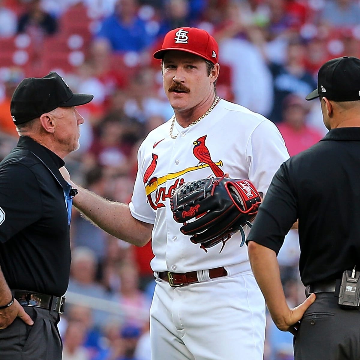 Cardinals pitcher Miles Mikolas reacts to ejection over throwing at Cubs'  Ian Happ after Willson Contreras injury
