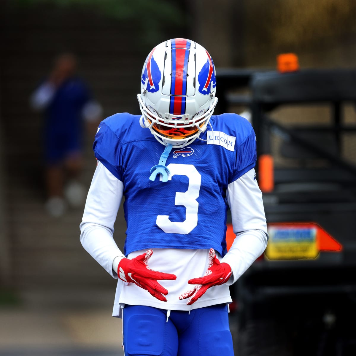 Damar Hamlin returns to the field with his helmet on