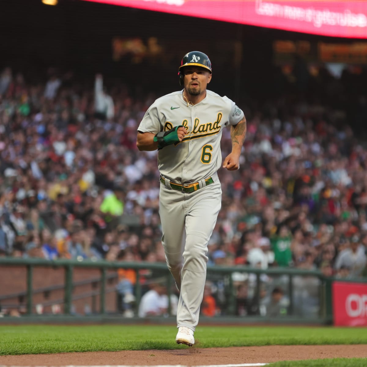 Jace Peterson of the Oakland Athletics points to the sky after he