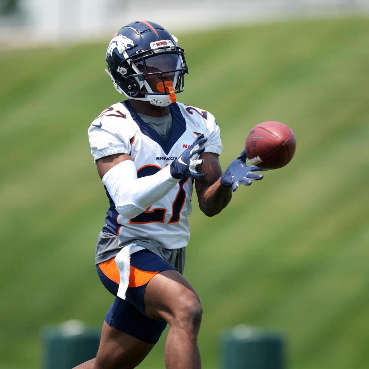 Denver Broncos rookie defensive lineman Eyioma Uwazurike takes part in  drills during the NFL football team's training camp Tuesday, Aug. 2, 2022,  at the Broncos' headquarters in Centennial, Colo. (AP Photo/David Zalubowski