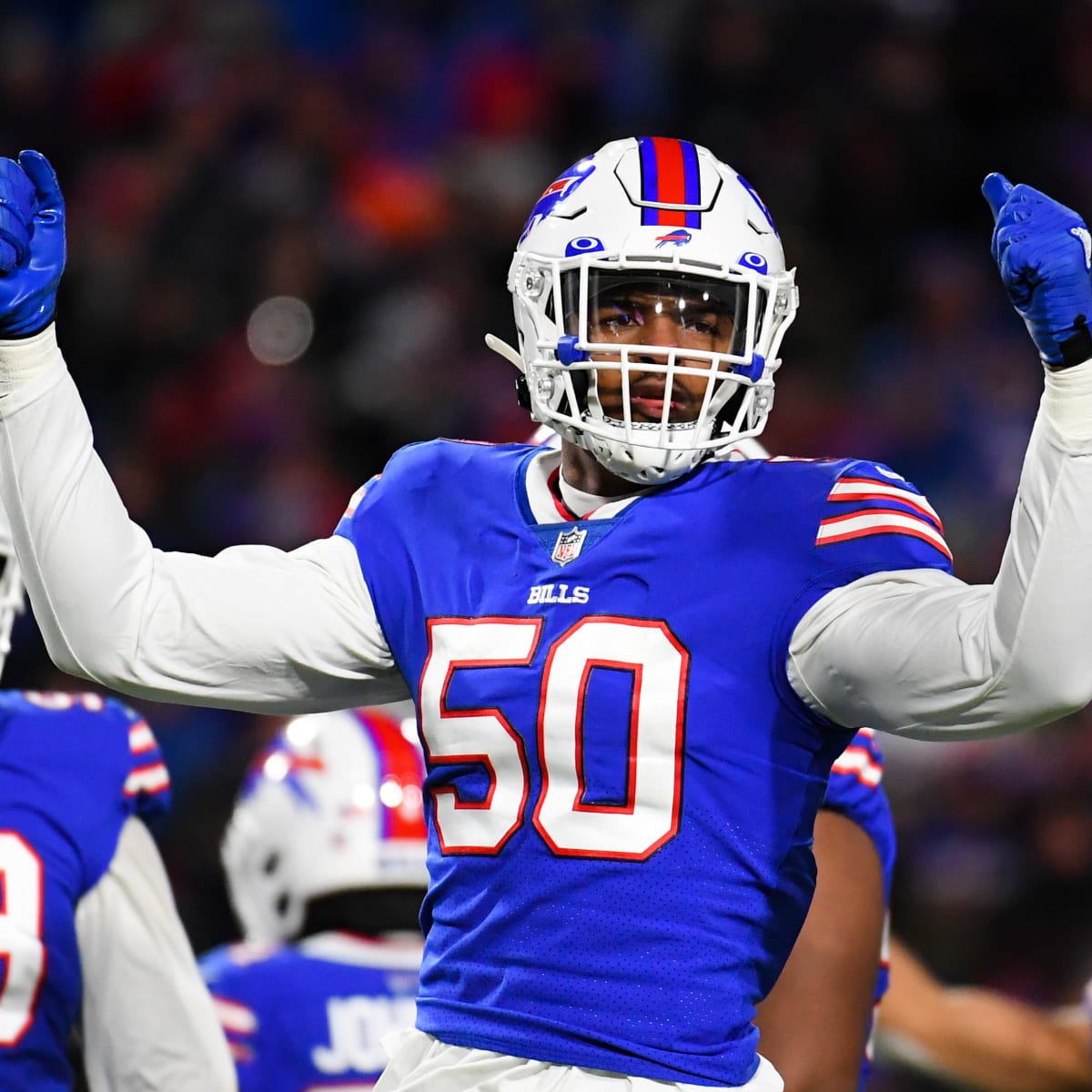 Buffalo Bills defensive end Greg Rousseau (50) runs onto the field