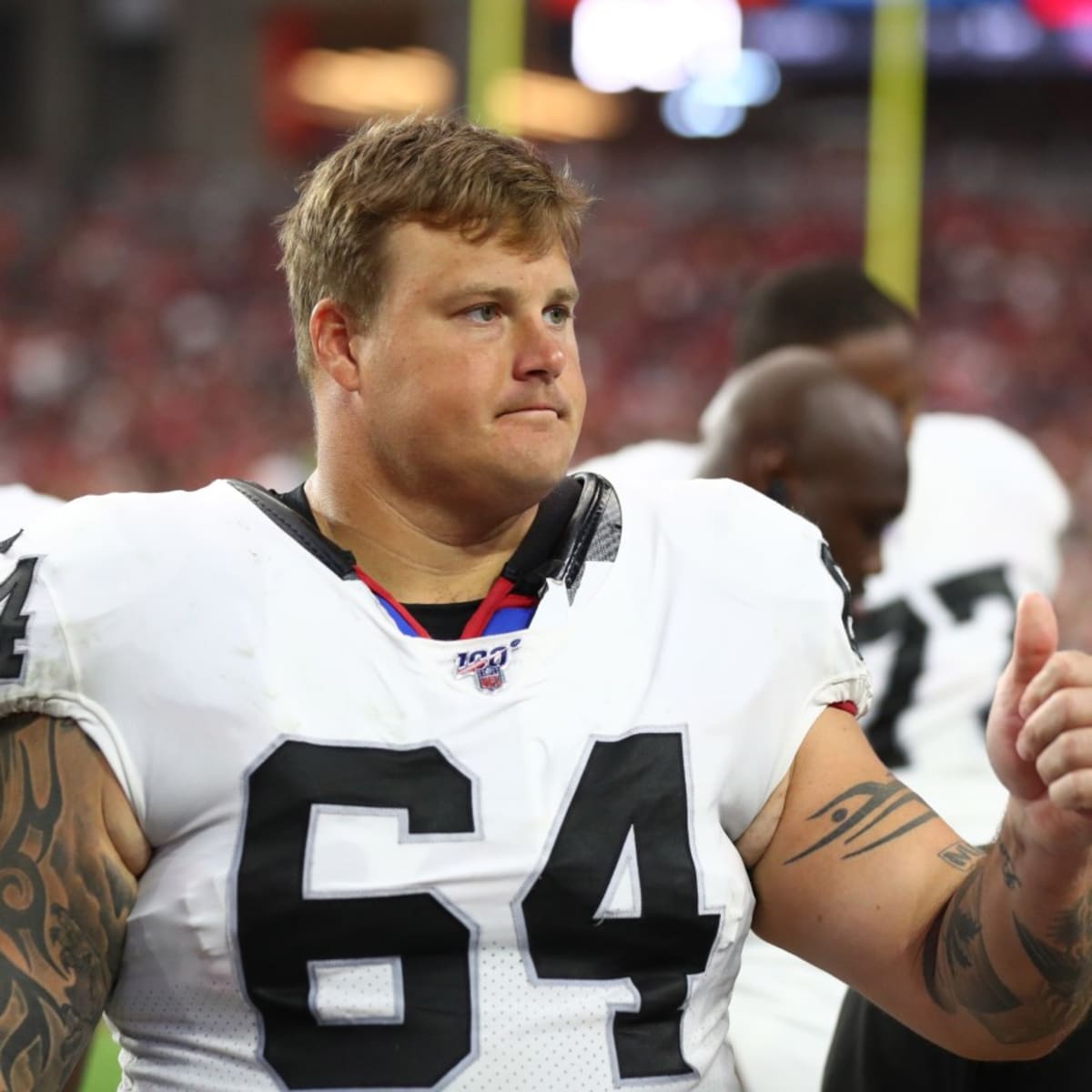 Las Vegas Raiders guard Richie Incognito (64) speaks to Los