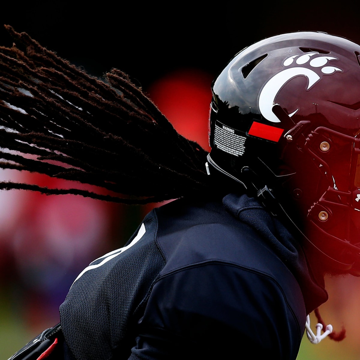 Commit to the grit: Inside Cincinnati football's climb from rock