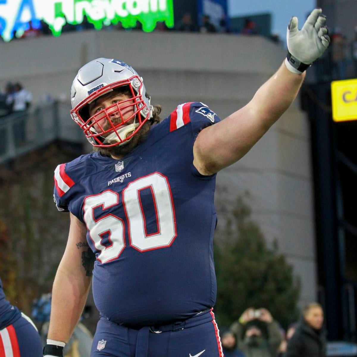 Patriots captain David Andrews helped to locker room after leg injury