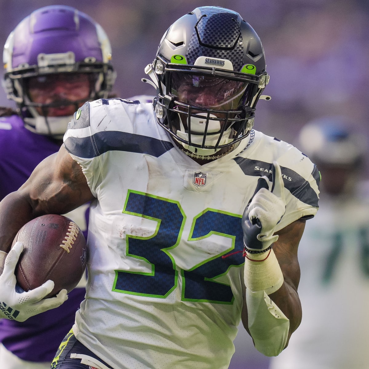 Seahawks keep feeding the ball to 'tired' Chris Carson