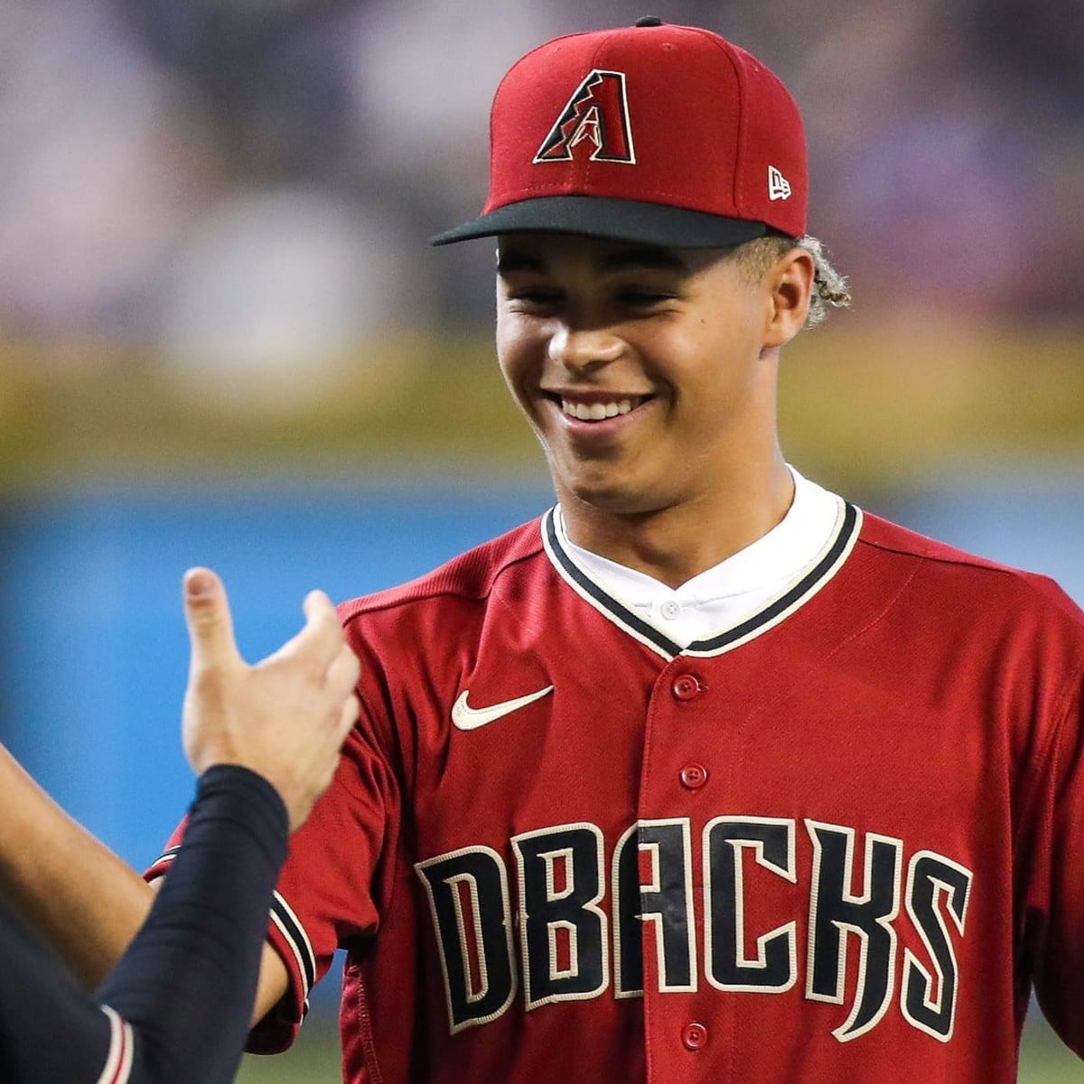 Arizona Diamondbacks first round MLB draft pick Druw Jones throws out the  first pitch prior to a baseball game against the Washington Nationals  Saturday, July 23, 2022, in Phoenix. (AP Photo/Ross D.