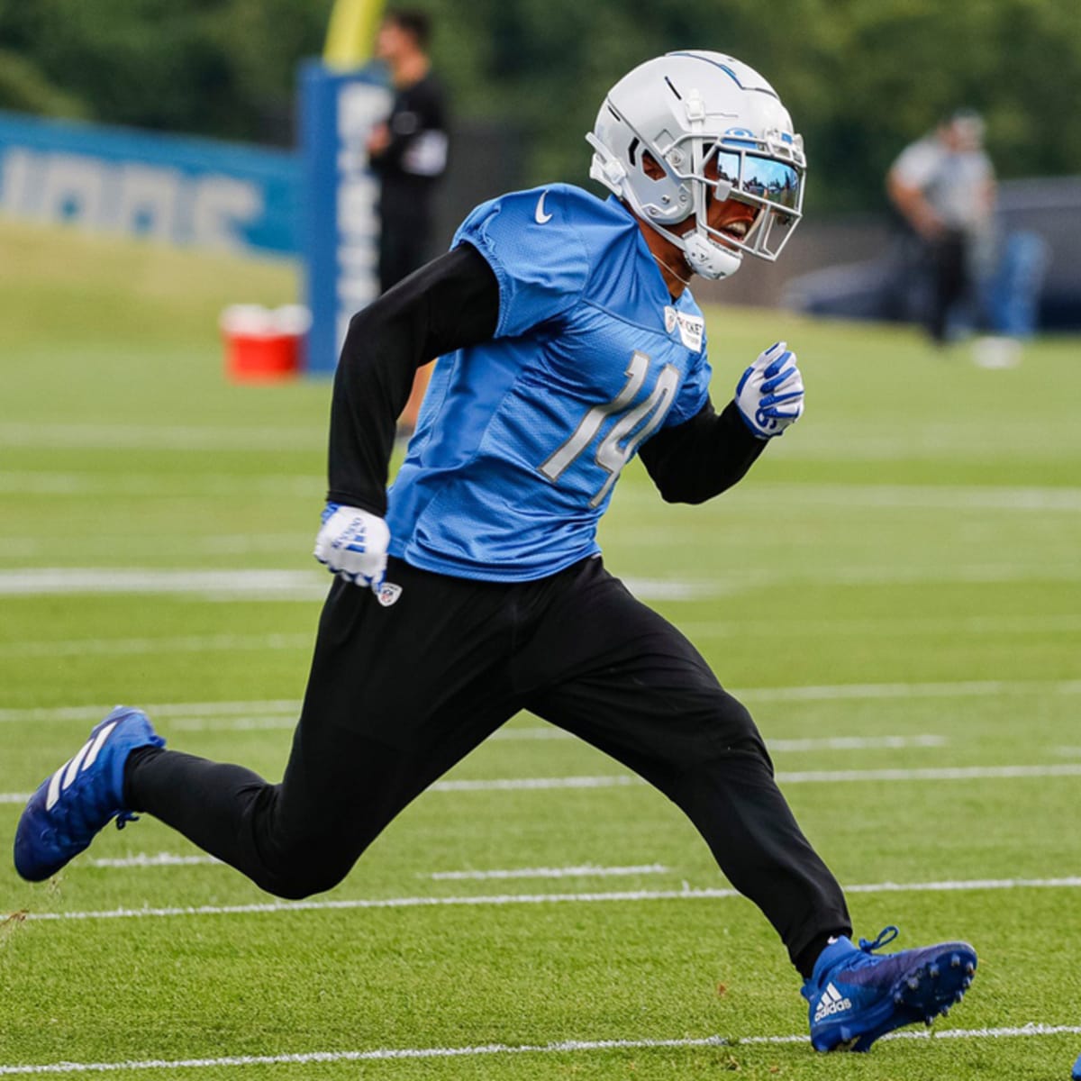 Amon-Ra St. Brown of the Detroit Lions runs with the ball as Benjamin  News Photo - Getty Images