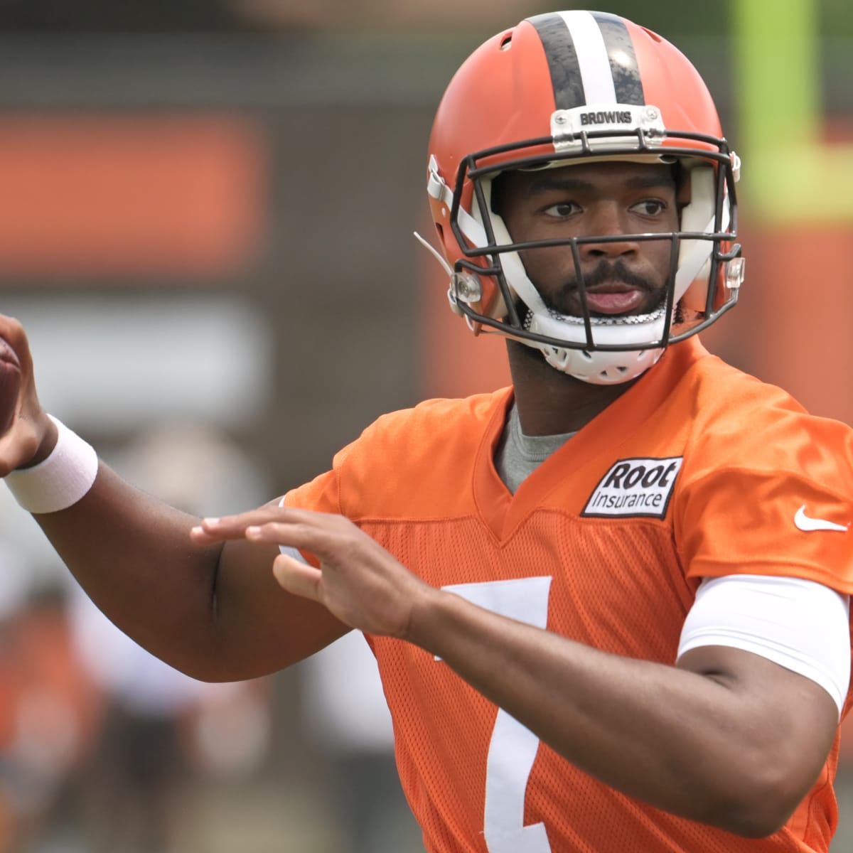 Cleveland Browns quarterback Jacoby Brissett (7) grimaces as he