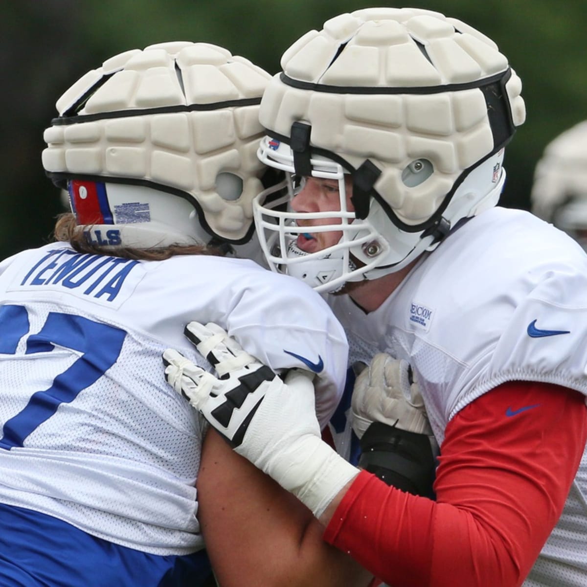 Patriots, rest of NFL wearing cushioned helmet caps at training camp, per  new mandate - CBS Boston