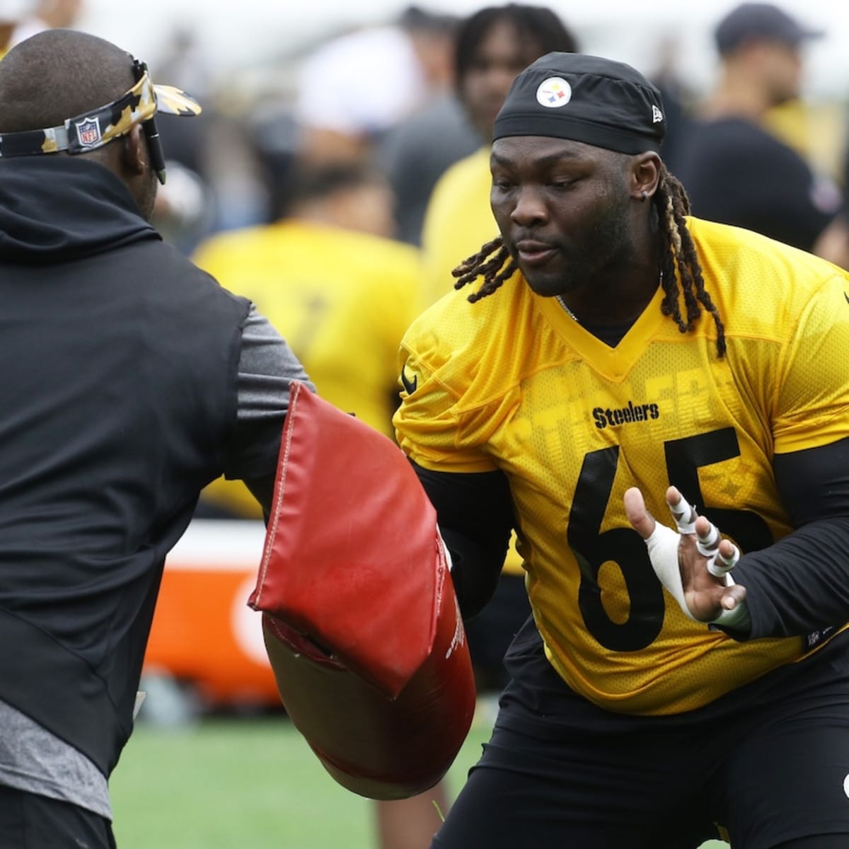 Pittsburgh Steelers defensive tackle Larry Ogunjobi (99) walks off of the  field at half time during an NFL football game against the Cleveland  Browns, Thursday, Sept. 22, 2022, in Cleveland. (AP Photo/Kirk