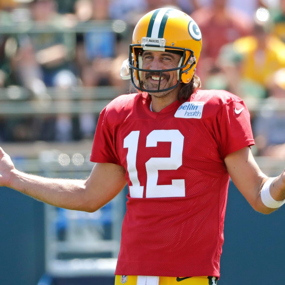 Green Bay Packers quarterback Danny Etling (19) runs for a touchdown during  an NFL Preseason game against the New Orleans Saints Friday, Aug. 19, 2022,  in Green Bay, Wis. (AP Photo/Jeffrey Phelps